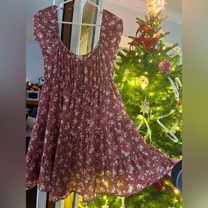 size M, runs a little big.